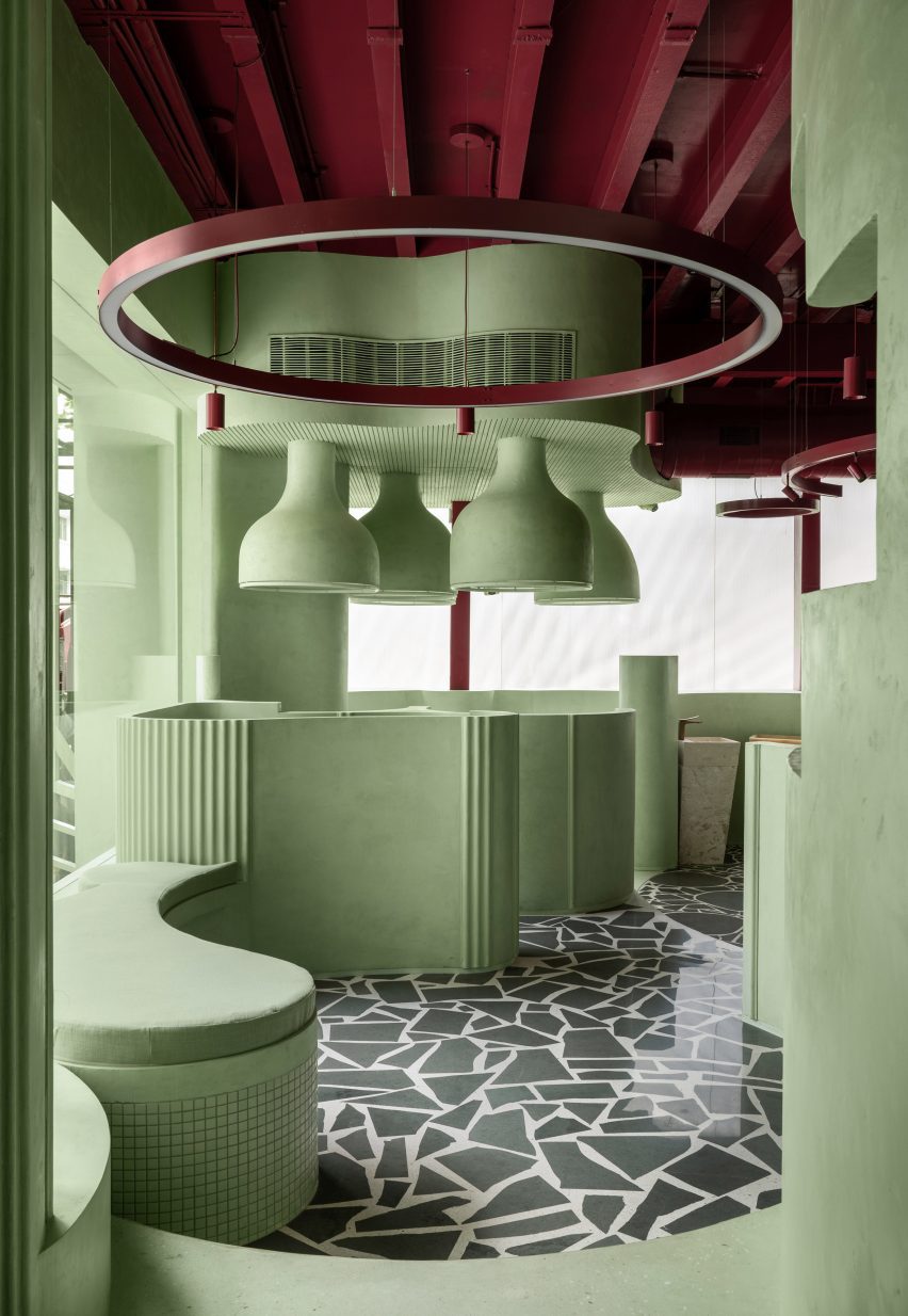 Mint-green interiors of a bathware showroom in Mumbai by MuseLAB.