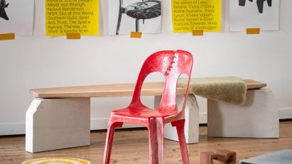 Red plastic chair in the Africa Chair exhibition