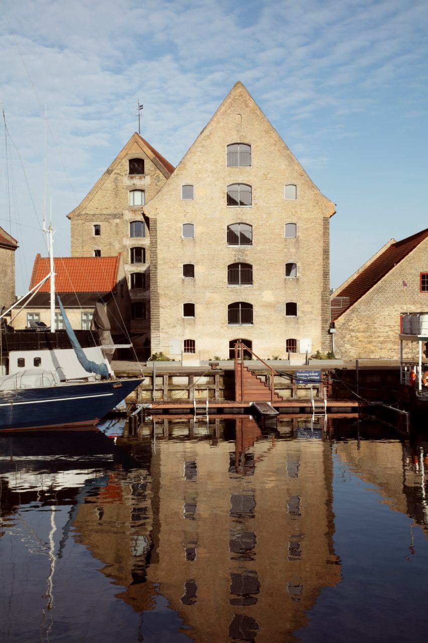 Warehouse apartment building on canal by David Thulstrup