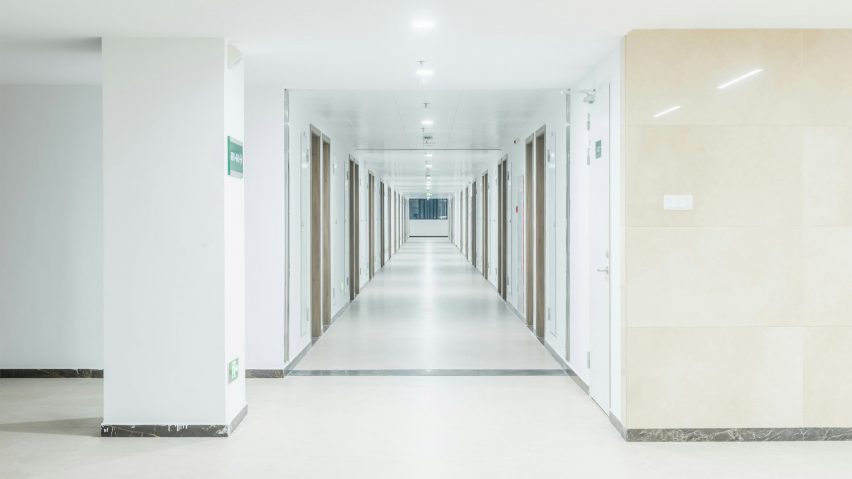 A hallway with harsh lighting