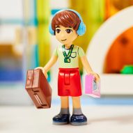 Lego character wearing sunflower lanyard