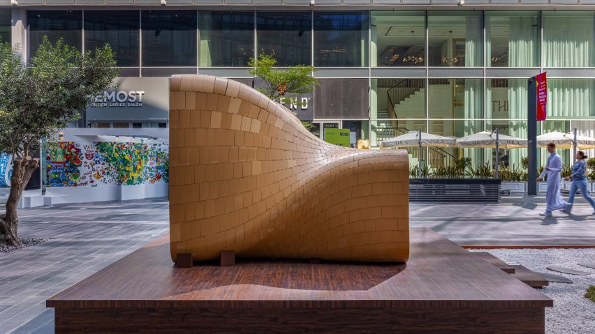 Japanese joinery and 3D-printed wood waste combine to form The Warp pavilion