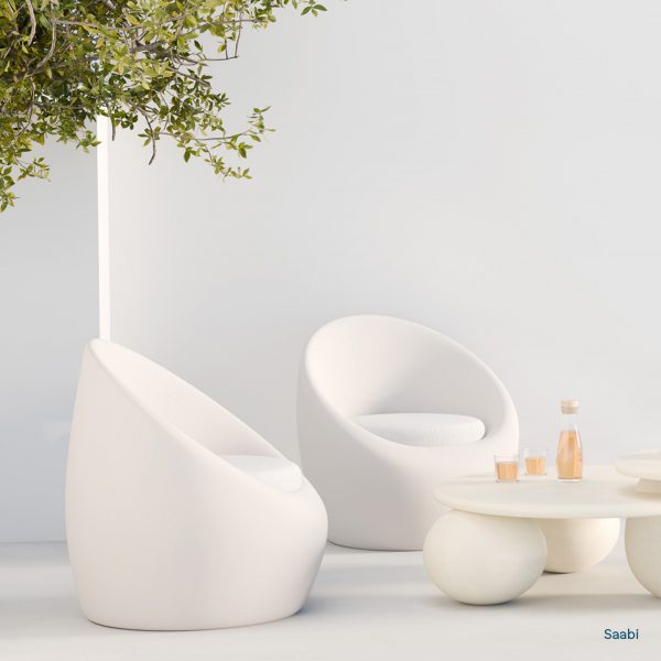 Photo of sculptural white chairs and coffee table