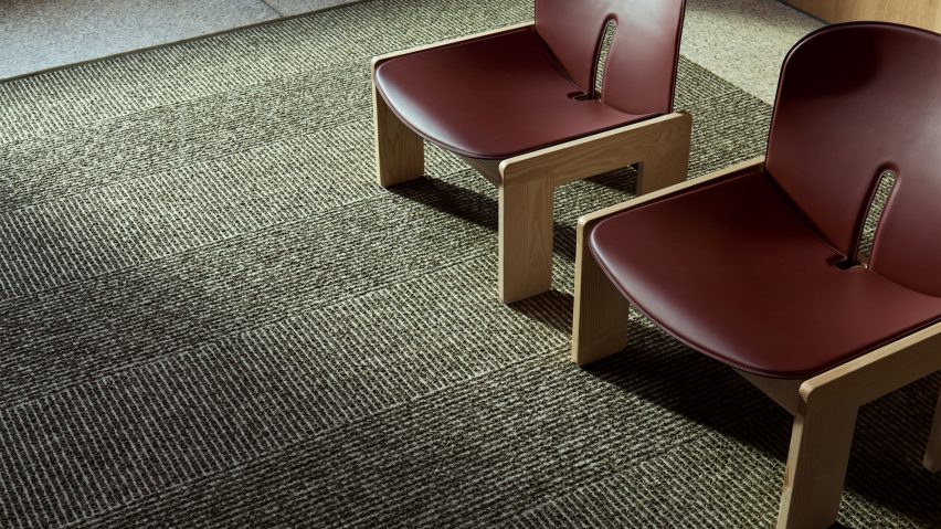 Photo of red chairs on a Kasthall rug