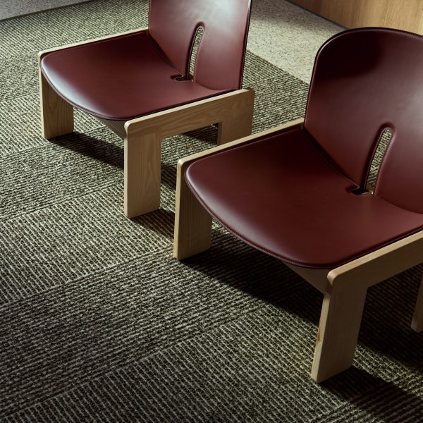 Photo of red chairs on a Kasthall rug
