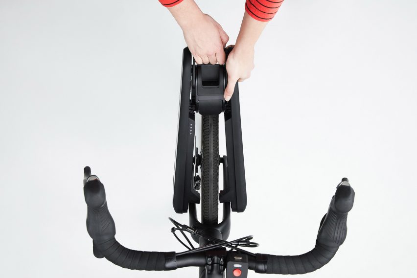 CLIP e-bike conversion device attached to front wheel