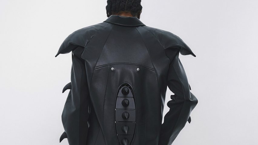 a person wearing a leather black garment