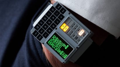 Close-up photo of a DSKY Moonwatch on a person's wrist