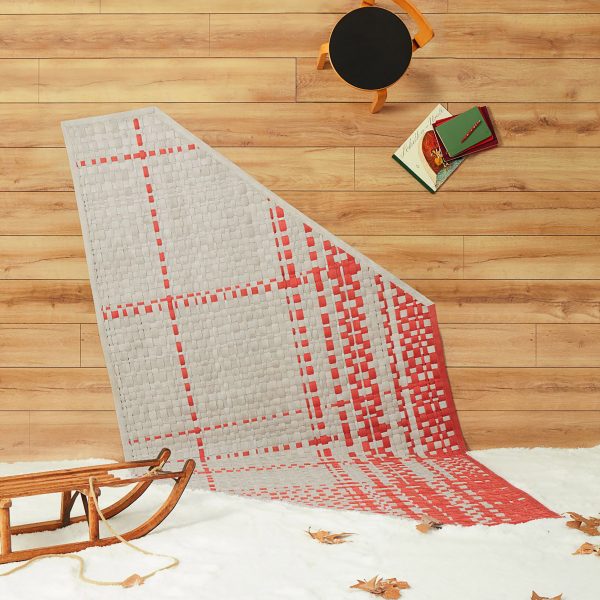 Rug made from discarded fire hoses