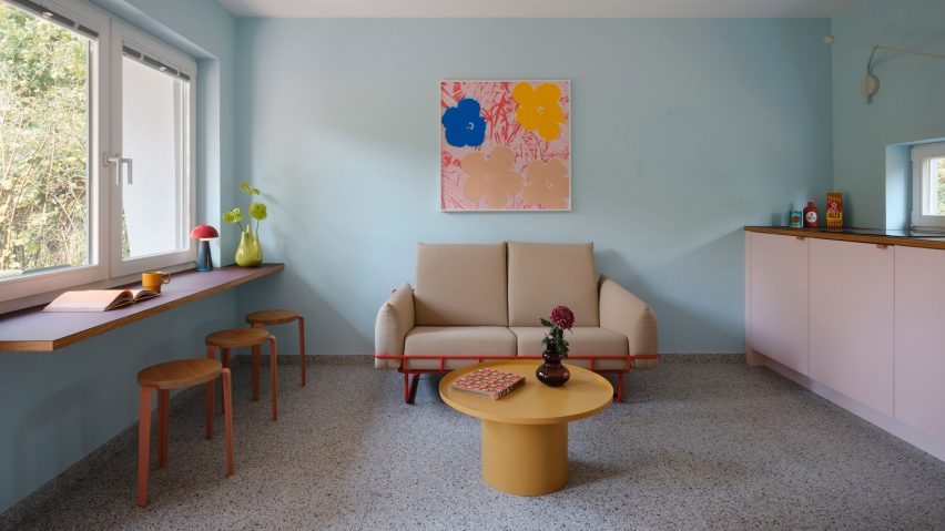 Pastel-blue living room in holiday home