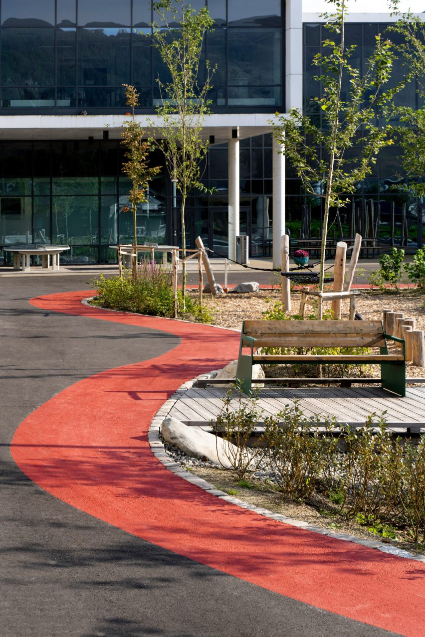 Pathways weave around seating and planted areas