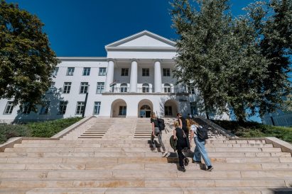 MOME's outside campus, including stairs that lead to a white building