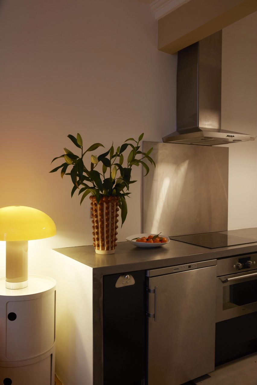 Kitchen in Paris pied-à-terre by The House Special Studio.