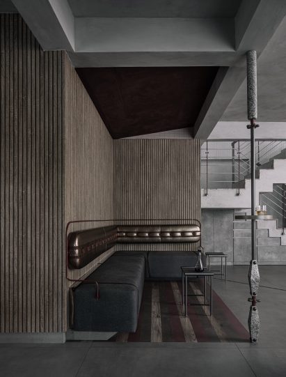 Pub-style seating in an apartment in Bengaluru designed by Multitude of Sins