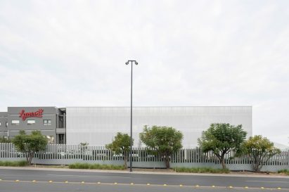 Polycarbonate wrapped mass timber building