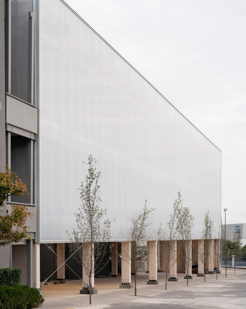 Mass timber structure with polycarbonate panels