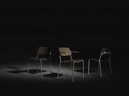 Photo of three Reviv chairs by Rianne Koens, showing dark, mottled plastic-like seats and backrests made from Rezign veneer by Planq