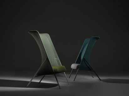 Two Koza chairs by Jones & Partners, with stretchy-looking, curvaceously shaped 3D-knitted backrests, both in different shades of greyish green