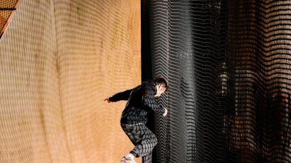 Man skating in Vans store