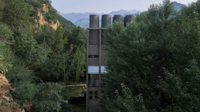 Concrete spa surrounded by forest in China