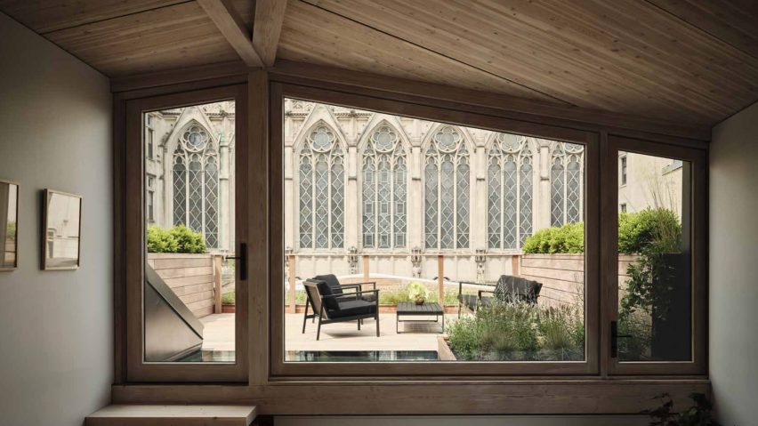 Photo of a home with timber ceiling and panels