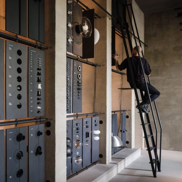 Photo of person on ladder in PSLab showroom