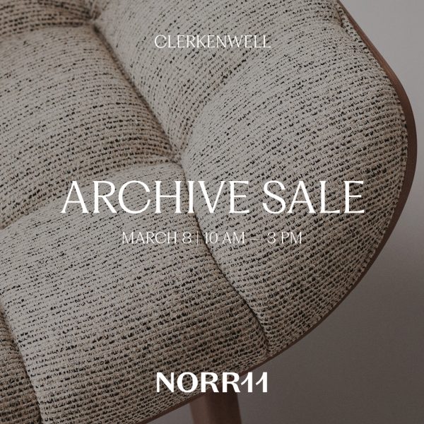 Photo of fabric on a chair with text overlay for the Norr11 Archive Sale