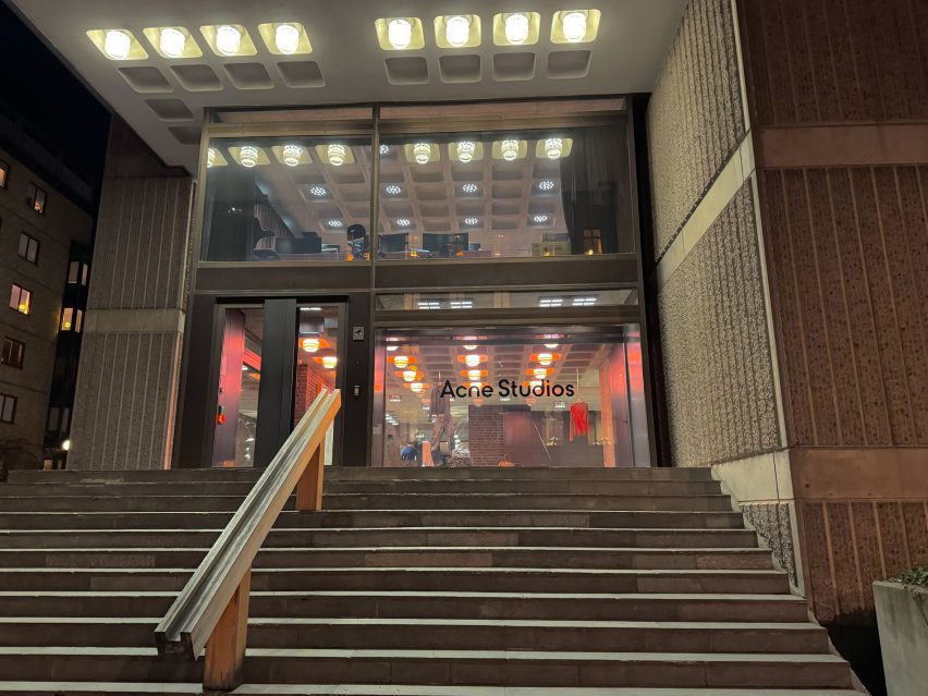 Concrete steps leading to glass doors