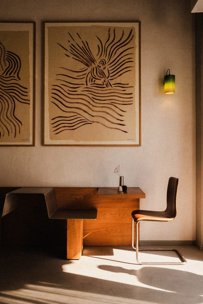 Wooden sideboard and steel-and-leather chair