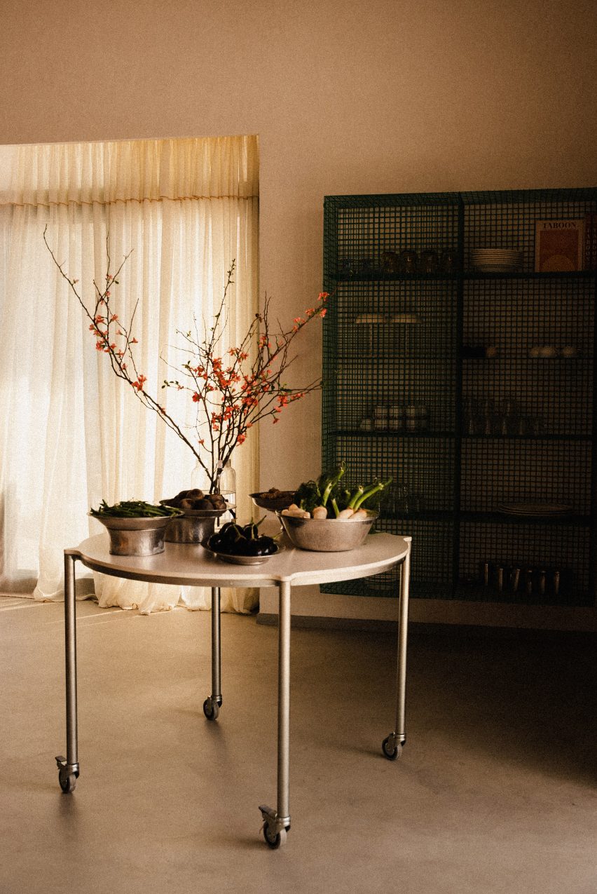 Steel table with flowers on it