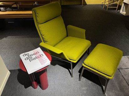 Upholstered chair and footstool
