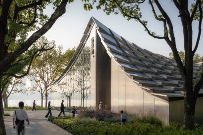 Exterior view of lakeside pavilion by BIG