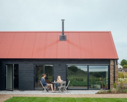 People sitting in garden of Cairnconon Byre in Angus