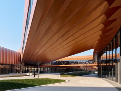 Bridge over a courtyard at Capital International Exhibition and Convention Centre by Zaha Hadid Architects