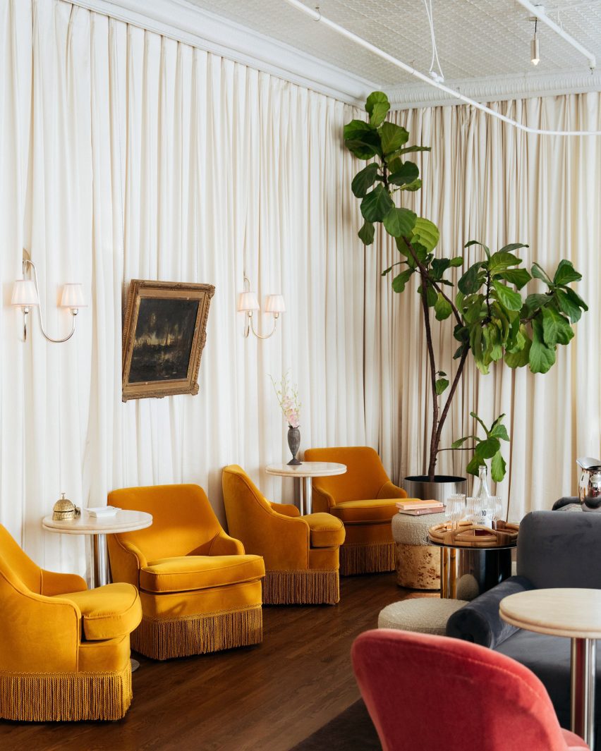 Colourful seating at Le Lounge hotel lobby and bar