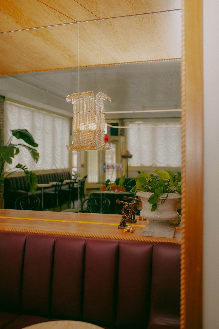 Purple bench seating with pendant light