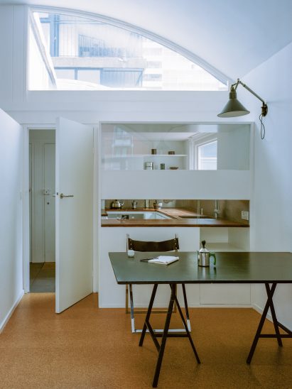 White-walled interior of Crescent House flat by TYPE