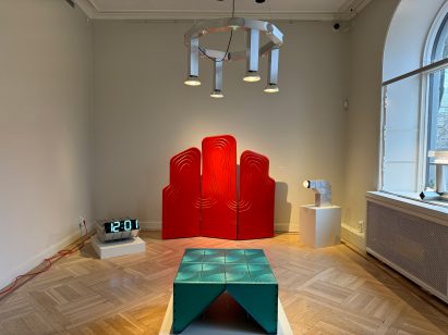 gallery space with design objects exhibited