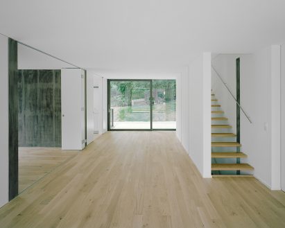 White-walled interior of Detached House in Basel