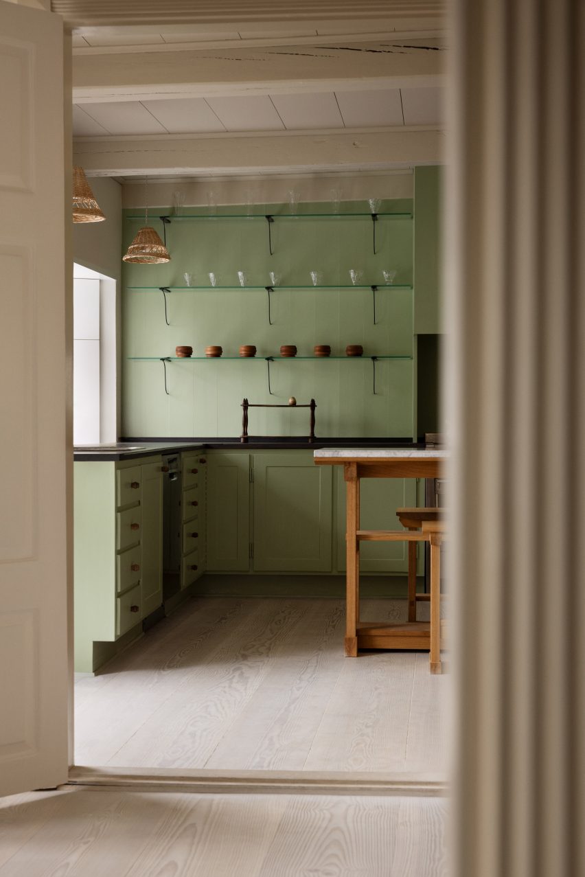 Green kitchen in Dinesen Country Home renovation by Mentze Ottenstein