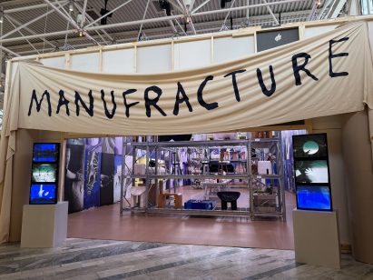 big banner reading manufracture
