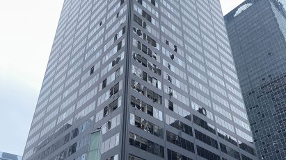 A building damaged by wind