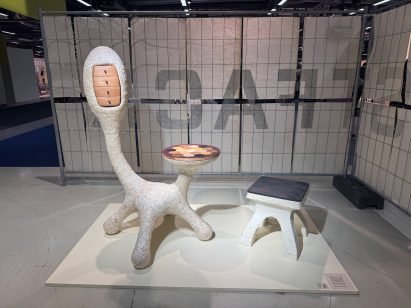 Chair with long back in an exhibition space
