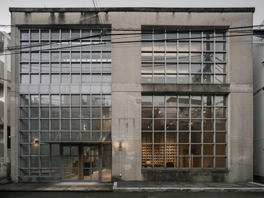 Concrete building with gridded glass windows Tokyo