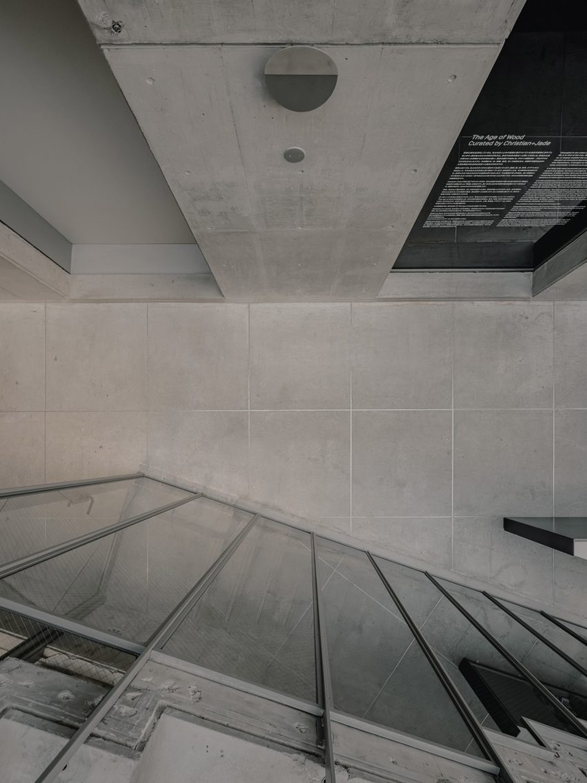 View peeking over staircase at Karimoky Research Center onto floor below