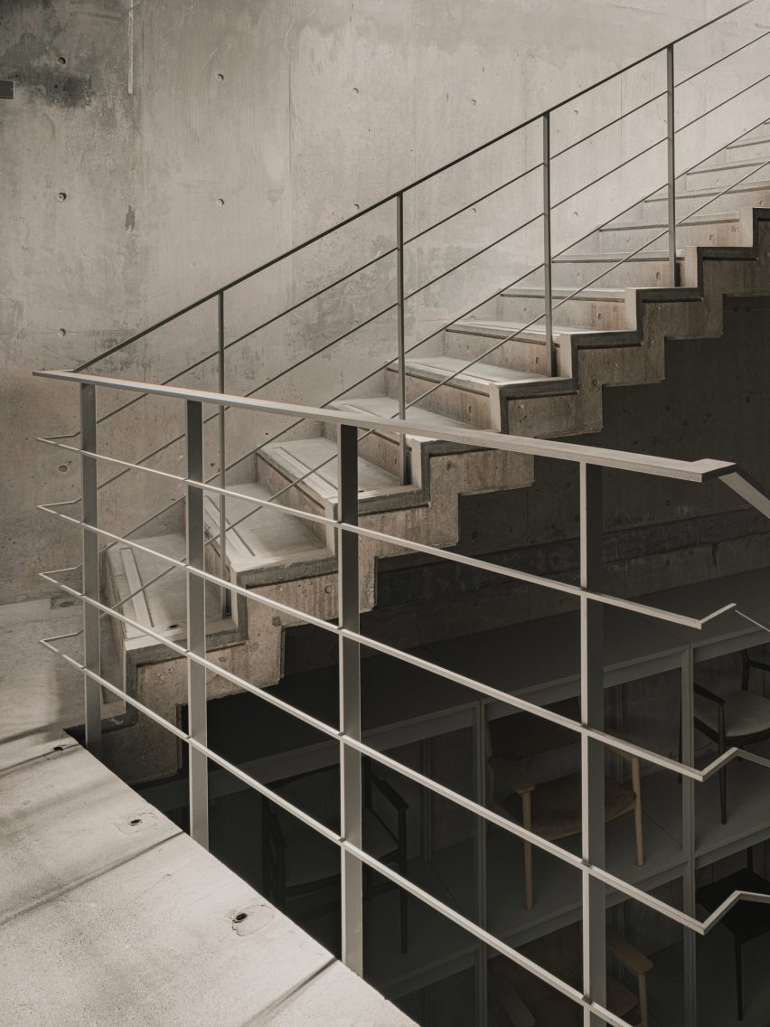 Concrete staircase with steel railing