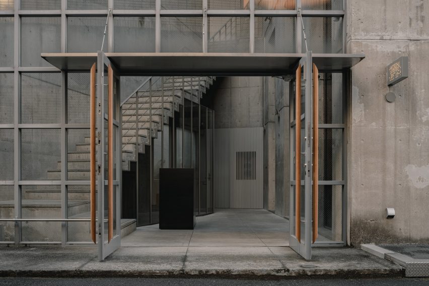 Entrance doors with steel and wooden details