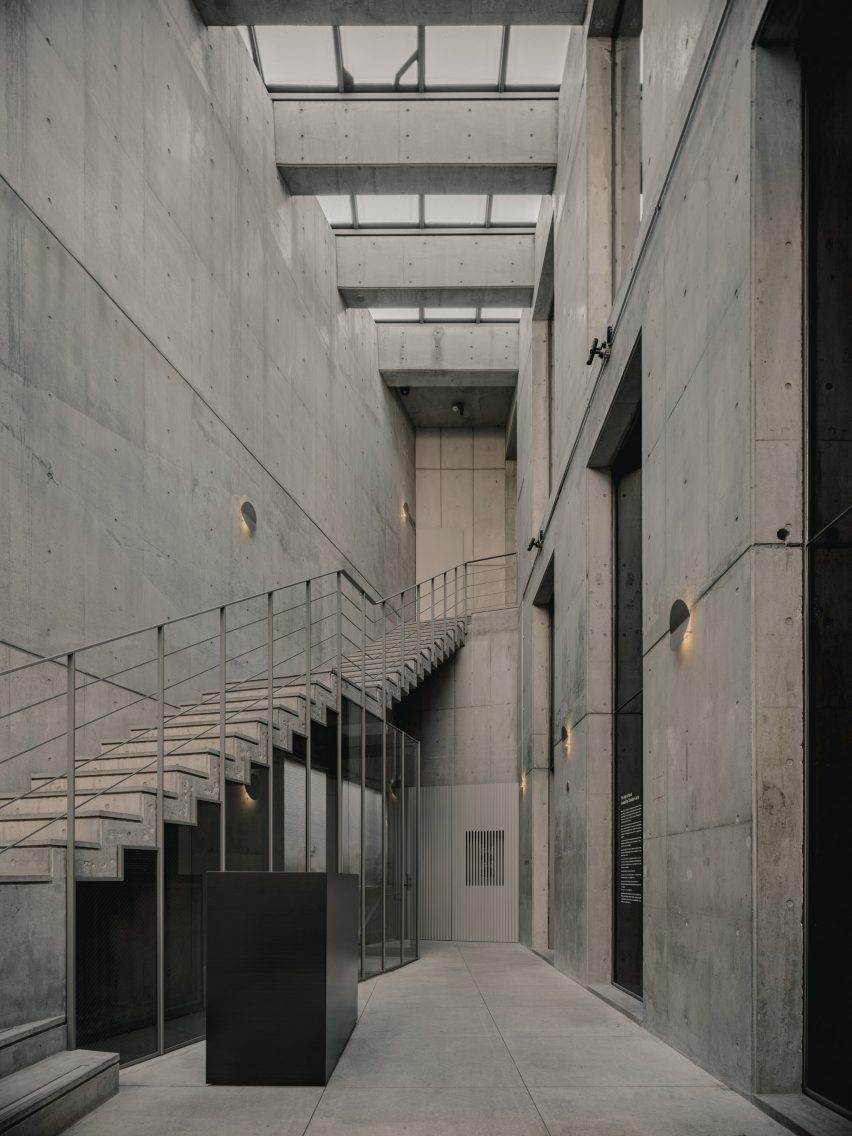 Large concrete entrance atrium with skylights