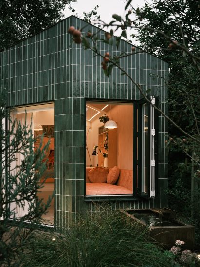 Green tile-clad garden studio in London by Delve Architects
