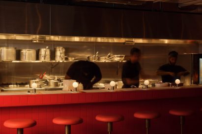 Red kitchen counter at Kricket Canary Wharf